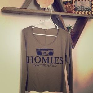 Long sleeved, cheeky shirt.